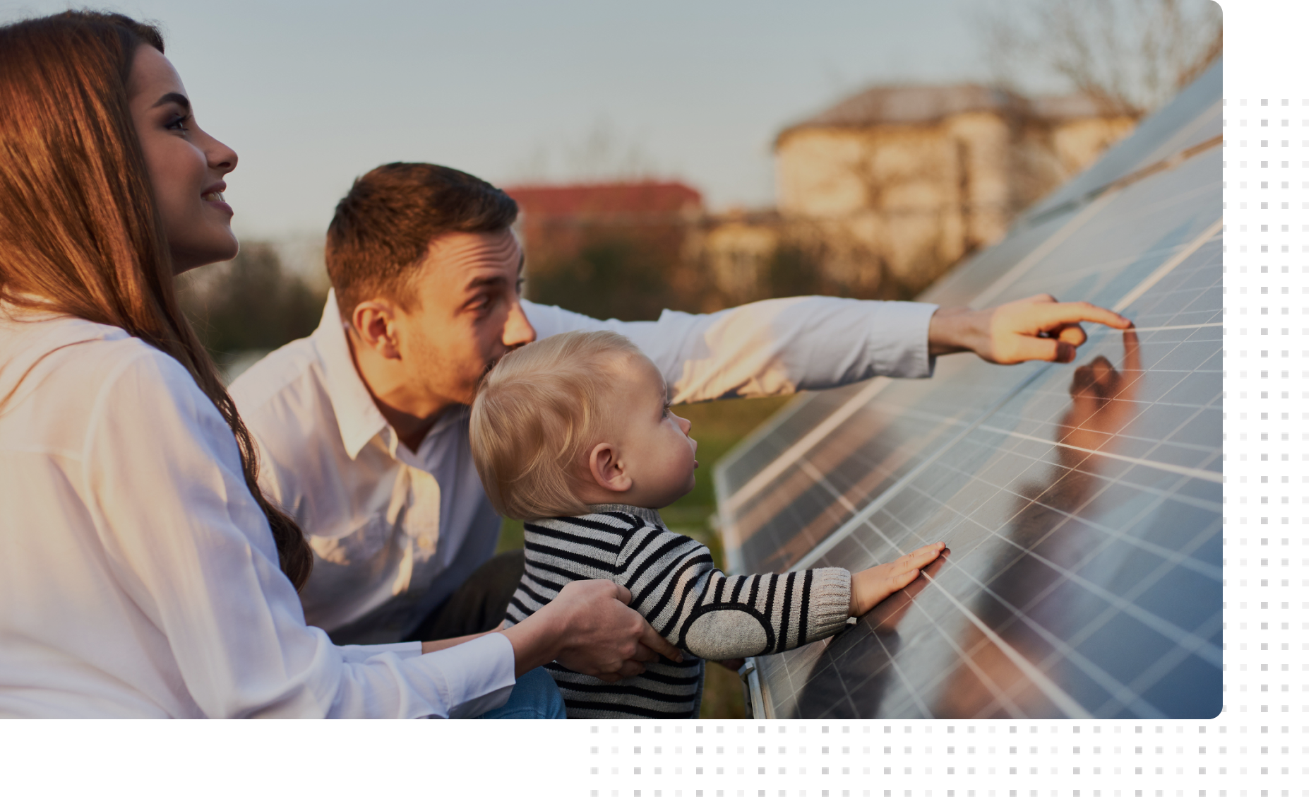 a family looking at a solar panel up close
